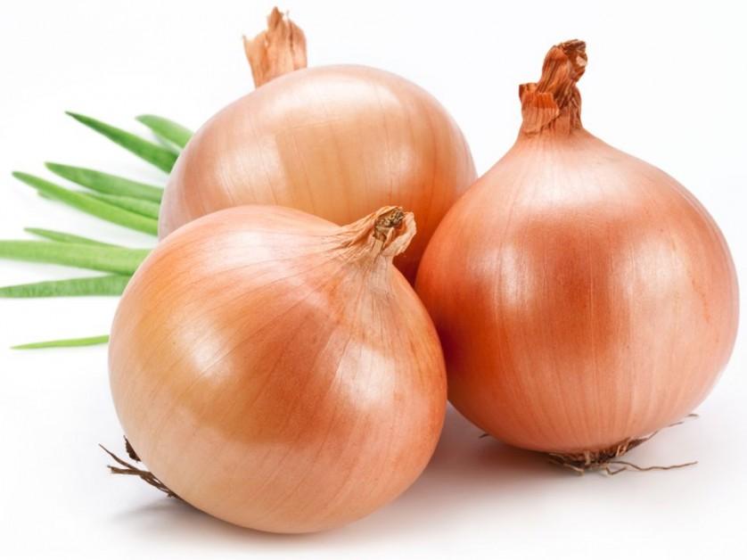 Three onions on a white background.