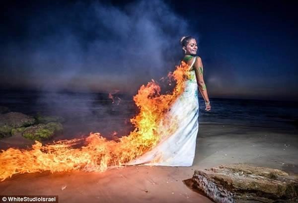 noiva coloca fogo no vestido para fotos